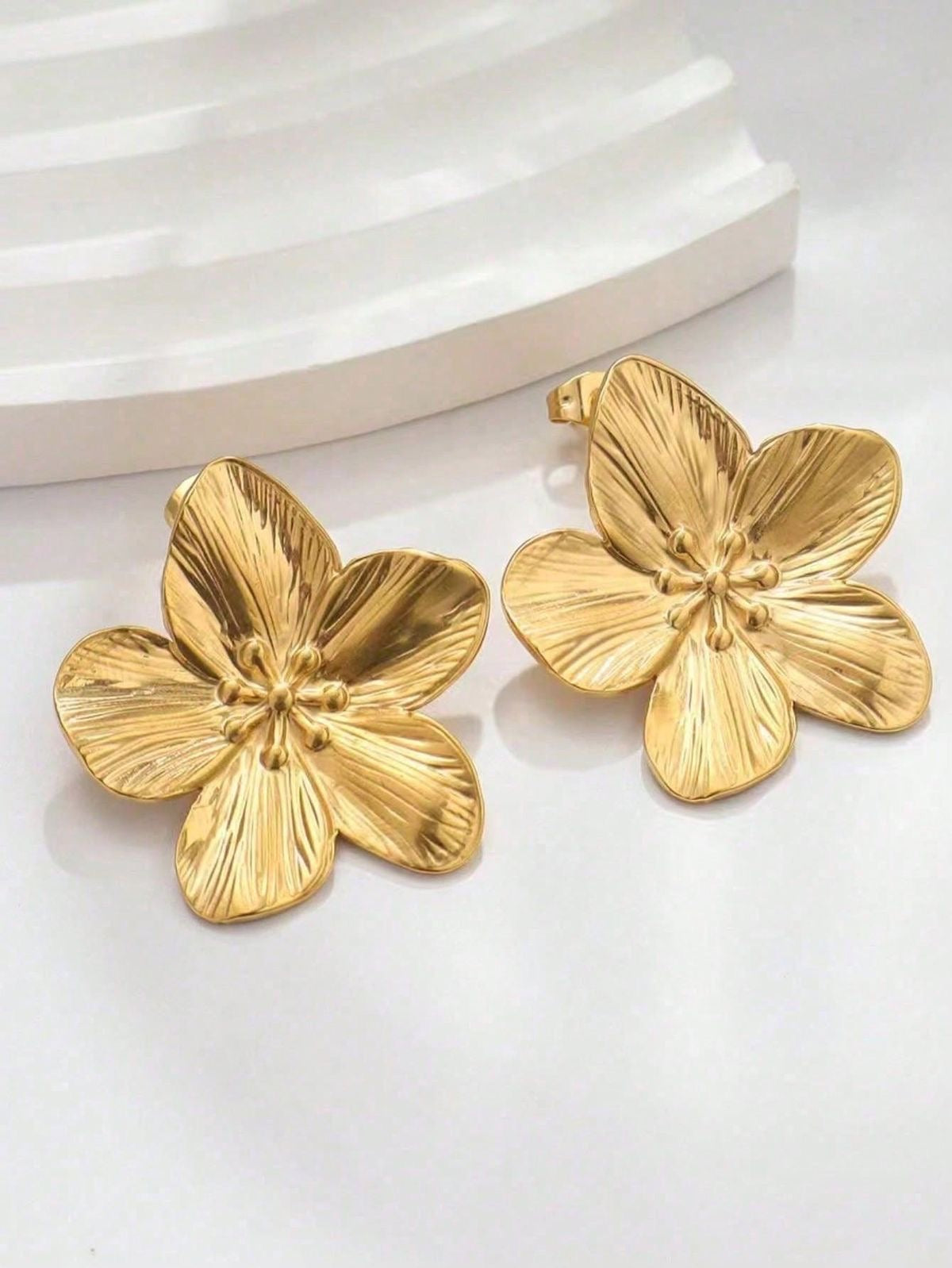 Aretes trendy flores