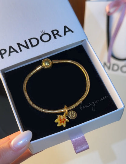 Brazalete charm Rapunzel flor dorada🌸💜☀️