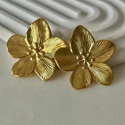 Aretes trendy flores