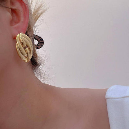 Aretes trendy nudo